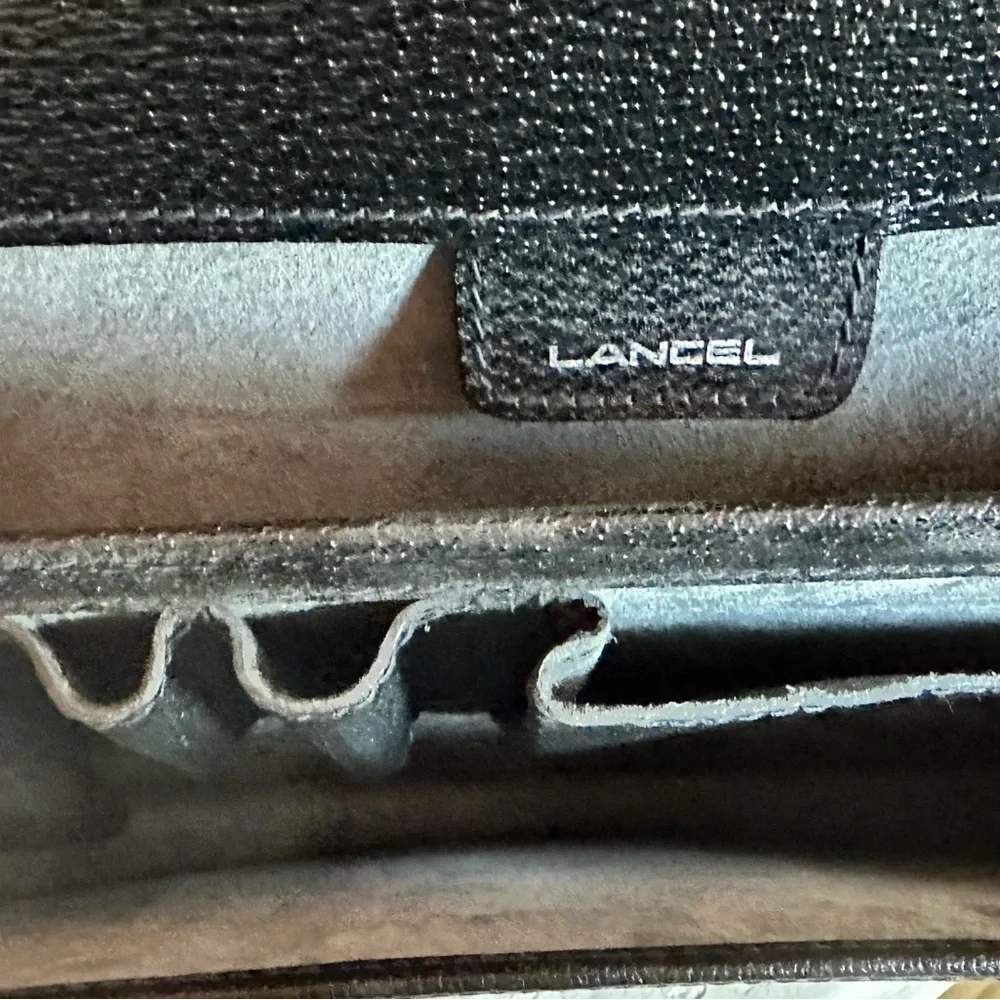 Lancel leather briefcase NWOT. Pristine condition. No strap. 11”x 15”